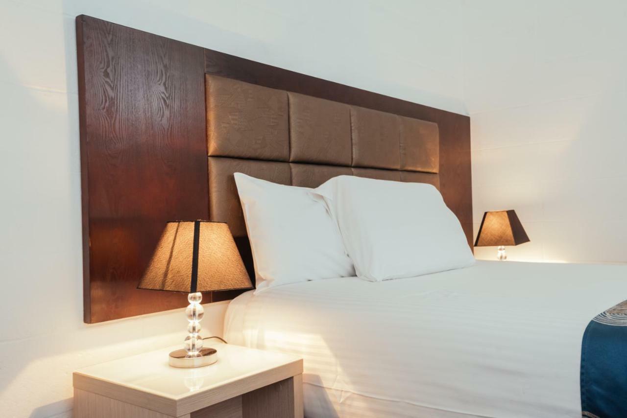 เดอะ บิ๊ก วินด์มิลล์ คอร์ปอเรท แอนด์ แฟมิลี โมเต็ล Motel คอฟฟ์ฮาร์เบอร์ ภายนอก รูปภาพ
